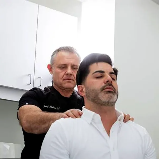 Shoulder and upper-back examination at Manhattan Chiropractic Health Services
